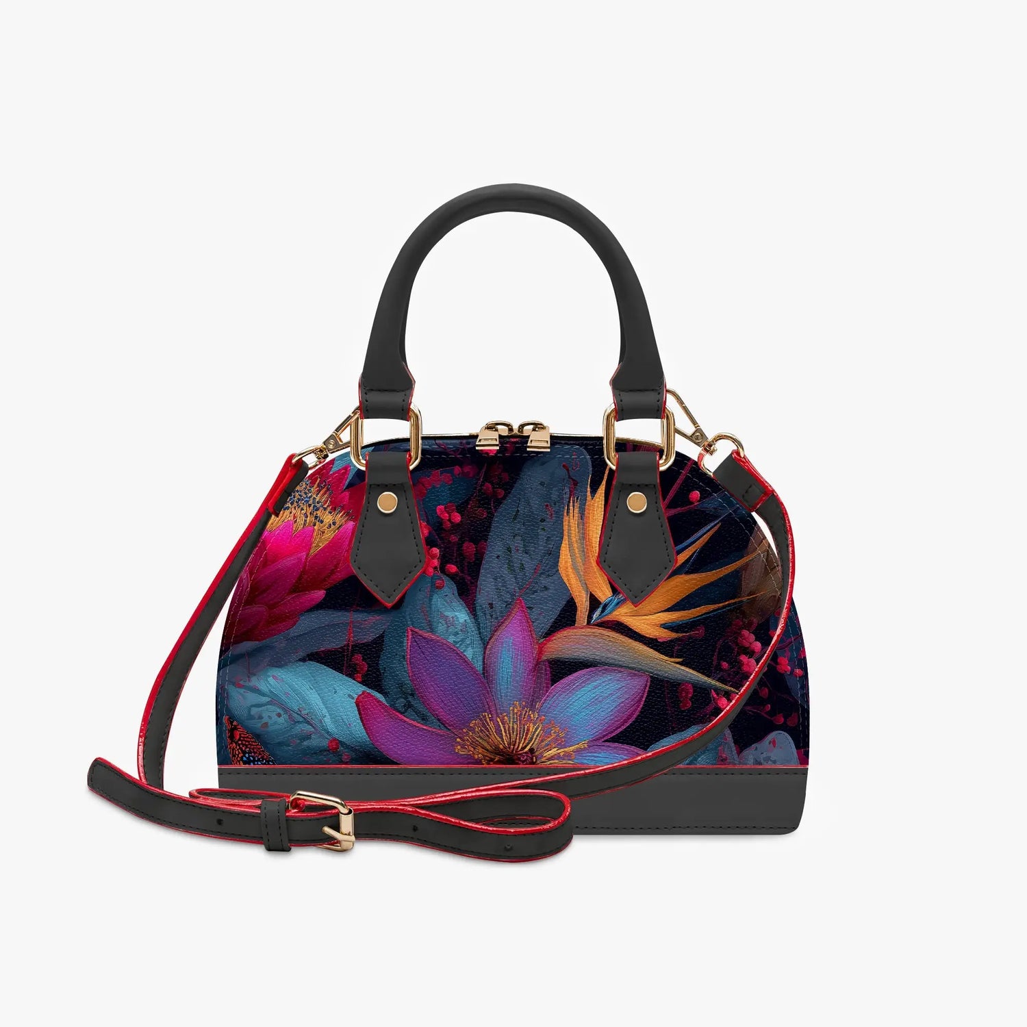 Eine vibrant gemusterte handtasche mit schwarzen ledergriffen und rot abgesetztem schulterriemen mit blumenmuster